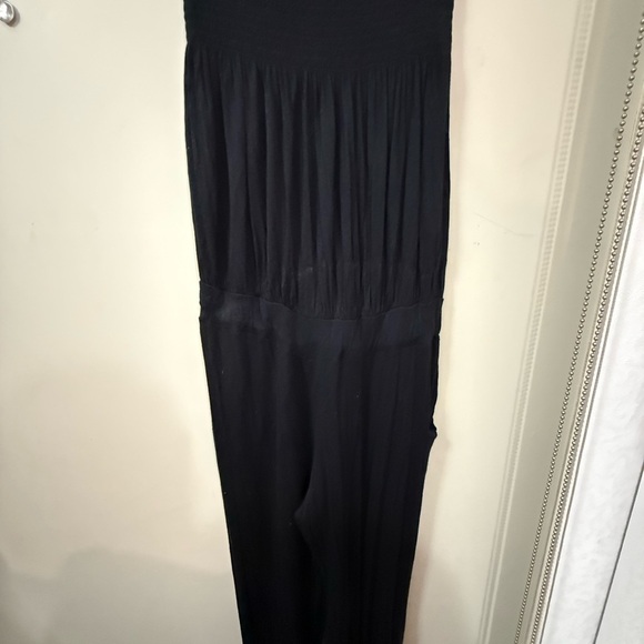 Sleek Black Jumpsuit with Pleated Design - Picture 1 of 2
